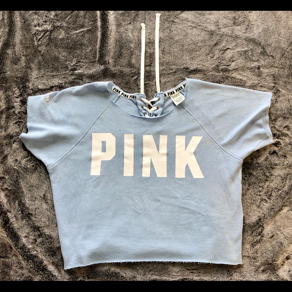 Pink Sweat shirt with tie up back. Super cute.